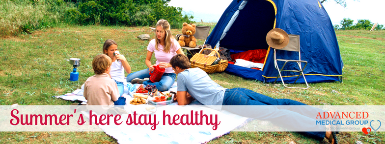 family camping in tents in summer
